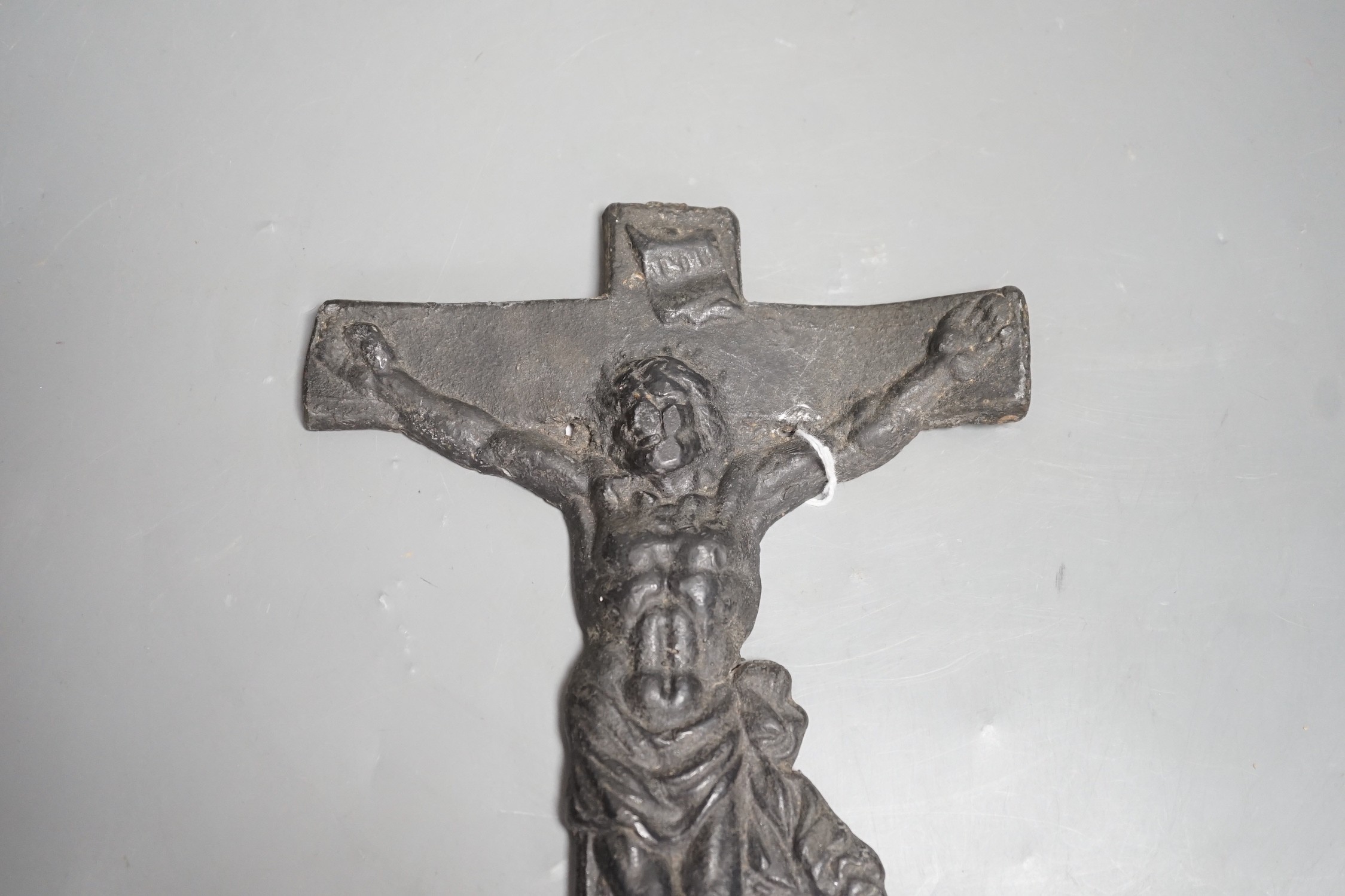 A lead coffin crucifix, 32cms high